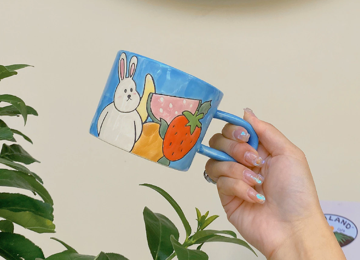 Peaceful Hand Painted Embossed Coffee Mug with Long Handle